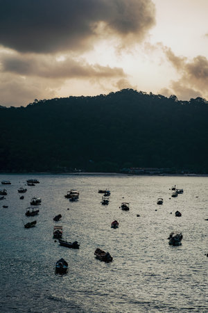 Terengganu, Malaysia - March 16, 2023 Colourful boats  near the floating jetty in Perhentian Island in the morning.のeditorial素材