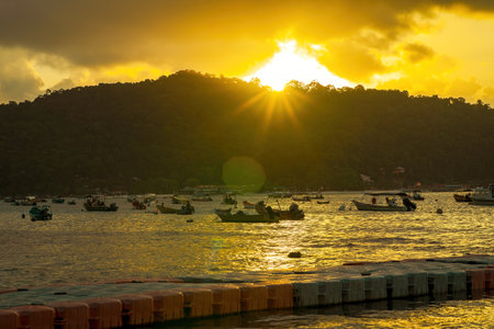 Terengganu, Malaysia - March 16, 2023 Golden sunrise in Perhentian Island.のeditorial素材