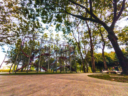 Modern playground with security fence surrounding at the Malaysia park.の写真素材