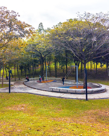 Modern playground with security fence surrounding at the Malaysia park.の写真素材