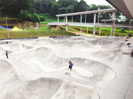 Putrajaya, Malaysia - January 2, 2023 At a public skatepark in Taman Cabaran, Putrajaya, people are...