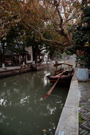 Shanghai, China - December 7, 2024 The famous water town with ancient boats in Zhujiajiao Old Town.
