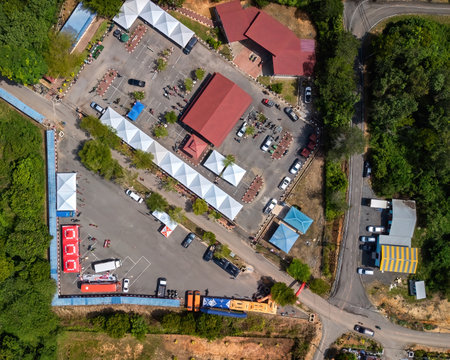 Kuala Tahan village parking space high angle view. Drone aerial photo.の写真素材