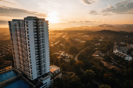 Golden sunrise aerial view near the apartment housing in Bandar Seri Putra, Malaysia.の写真素材