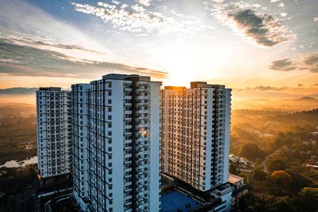 Golden sunrise aerial view near the apartment housing in Bandar Seri Putra, Malaysia.の写真素材