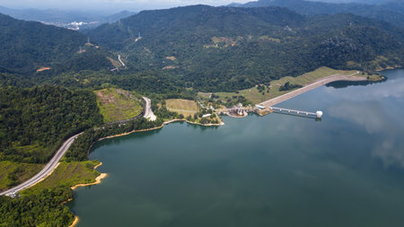 Green lake and rainforest tropical trees in Kuala Kubu Bharu, Malaysia.の写真素材