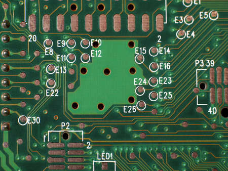 Green electronic circuit close-up. Macro background