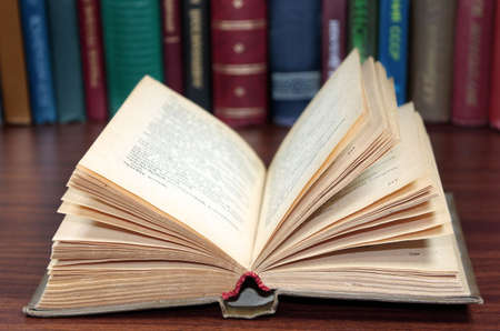Open book on the writing-table