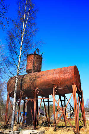 Rusty elevated water tankの写真素材
