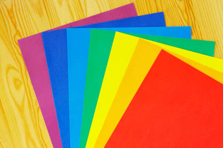 Colored paper is how the Rainbow colours on wooden
