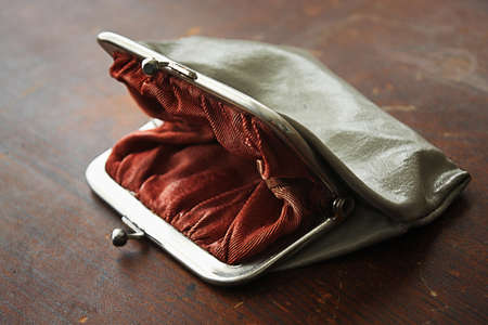 Empty pocket on the wooden tableの写真素材