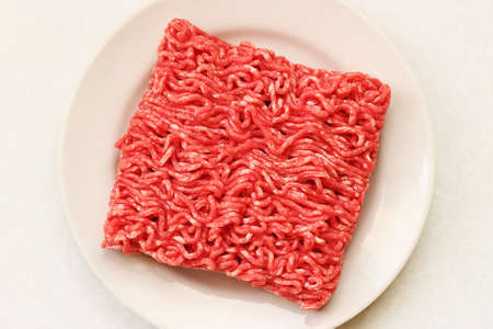 Minced meat on white plateの写真素材