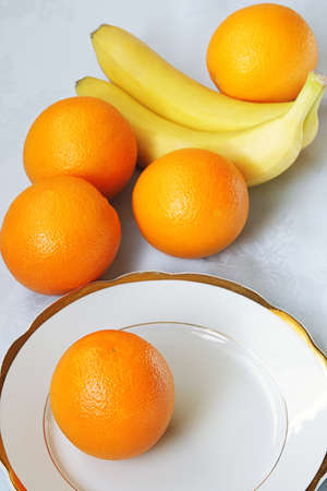 Oranges and bananasの写真素材
