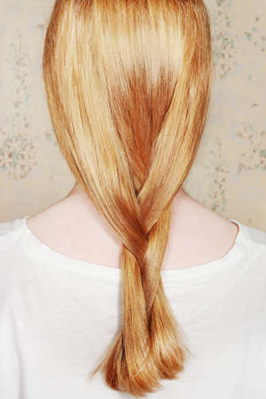 Young girl with long blond  hairの写真素材