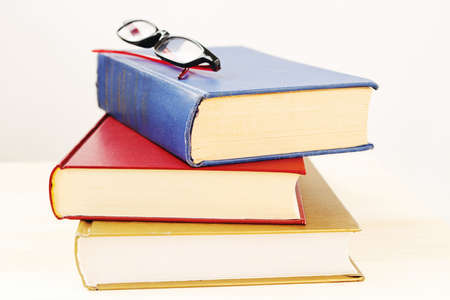 Three thick paper booksの写真素材