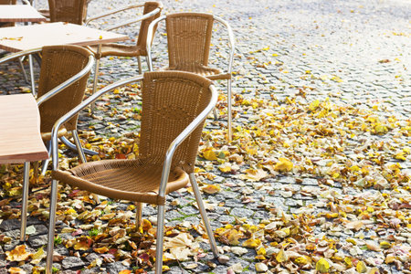 Empty open-air cafe in the autumn and text spaceの写真素材