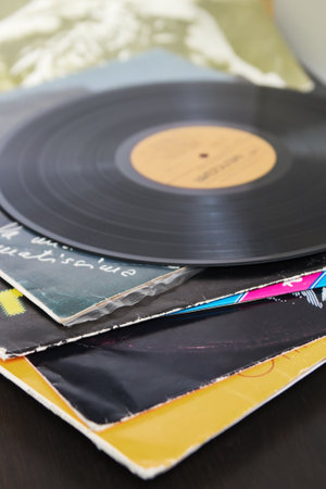 Vinyl recording disk and different albums with platesの写真素材