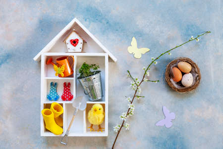Easter and spring decor on blue backgroundの写真素材