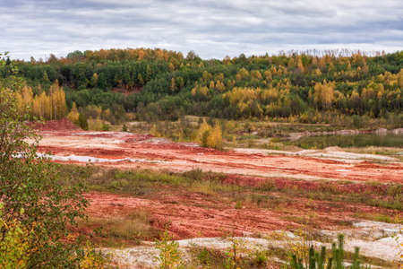 Autumn landscape in an abandoned clay quarry