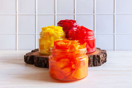 Close-up of multi-colored organic Cabbage in glass jars, fermented with various seasonings and other vegetables.の写真素材