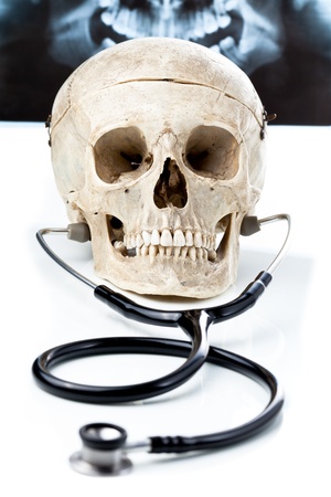 Human skull with a stethoscope.の写真素材