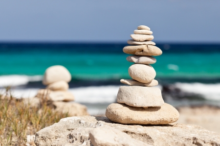Balanced stones near the beach の写真素材