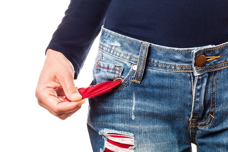 Woman showing empty pocket の写真素材