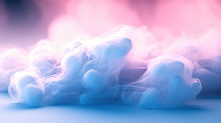 A beautiful light blue background with white smoke trailing across the floor with pink lighting. abstract background for presentationの素材