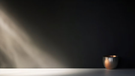 Empty light dark wall with beautiful chiaroscuro. Minimalist background for product presentation, mock upの素材