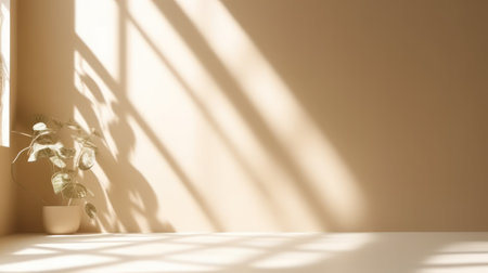 Minimalistic abstract gentle light beige background for product presentation with light and and intricate shadow from the window and vegetation on wallの素材
