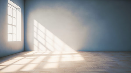 Light blue empty wall and smooth floor with interesting light glare. background for the presentationの素材