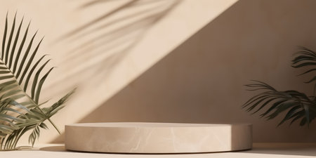 Marble beige podium with shadow from palm leaves on the wall. background for presentationの素材