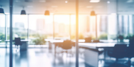 Beautiful blurred background of a light modern office interior with panoramic windows and beautiful...