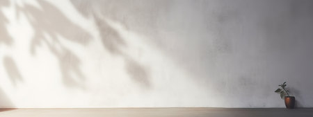 An original light background image with a slight shadow of a plant for the presentation of various products or goodsの素材