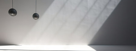 Minimal abstract light gray background for product presentation. Shadow and light from windows on plaster wallの素材