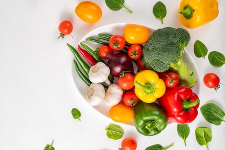 Whole vegetables on a white background, copy space.の写真素材