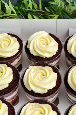 Trifle red velvet with cream in a gift box.の写真素材