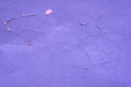 Lilac shabby textural background. Cracked paint wall.の写真素材