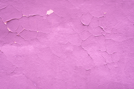 Lilac shabby textural background. Cracked paint wall.の写真素材