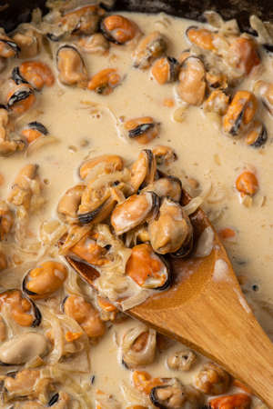 Mussels in a creamy sauce.の写真素材