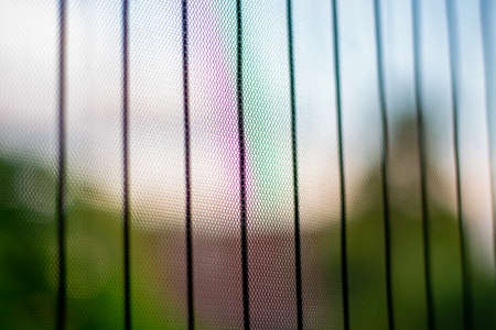 Close up of bug screen. Protective mesh on the window against insects.