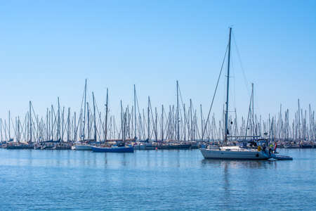 Yachts and sailing boats on calm water, clear blue sky. Seascape.の写真素材