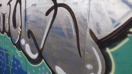 silver graffiti on railway hoardingsのeditorial素材