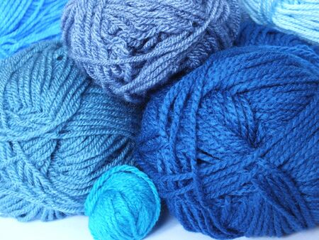 Balls of yarn in shades of blueの写真素材