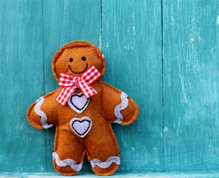 Shabby Chic felt Ginger Bread man on blue painted wooden boards