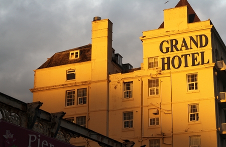 LLANDUDNO October  2014 Llandudno was originally built as a Victorian holiday resort and is still a popular Welsh holiday destination. The Grand Hotel enjoys a great location overlooking the bay, shot at duskのeditorial素材