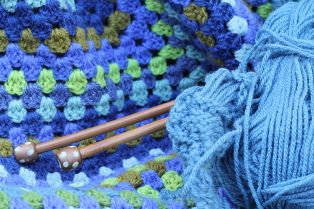 arn crafts, wool in blue and green , crochet afghan blanket, wooden knitting needles