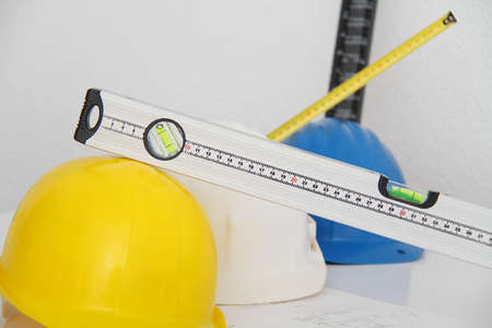 Helmets and tools for construction drawings and buildingsの写真素材