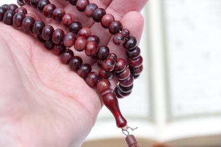 Photo of the Rosary and Qoranの写真素材