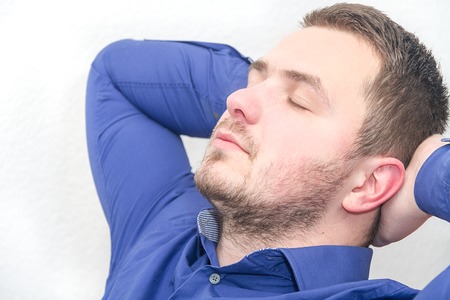 Photo of the Happy young business man work in modern office on computerの写真素材